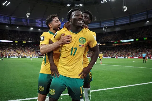 Nestory Irankunda celebrating a goal for Australia during their win over Turkey