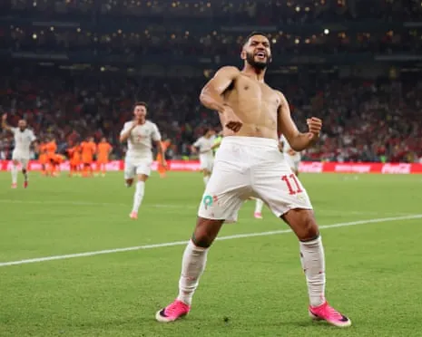 Ismael Saibari celebrates after scoring the winning penalty