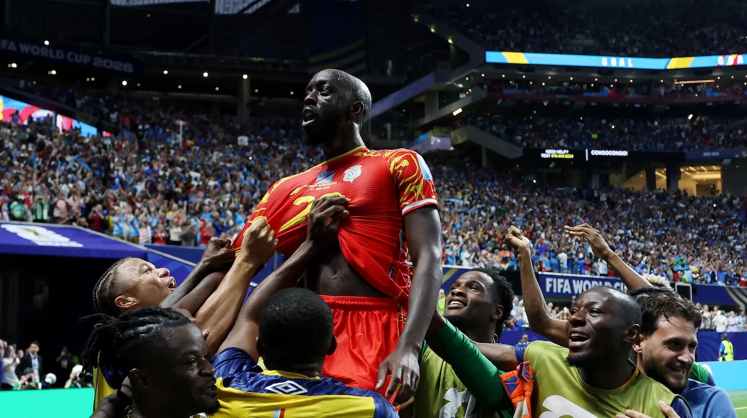 Yoane Wissa of Congo DR celebrates with teammates after scoring the team's third goal during the FIFA World Cup 2026 Group K match between Congo DR and Uzbekistan.