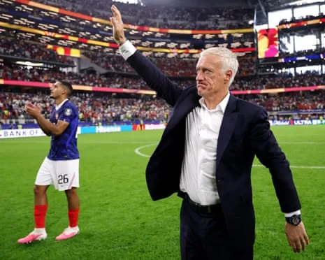 Didier Deschamps waves to the crowd