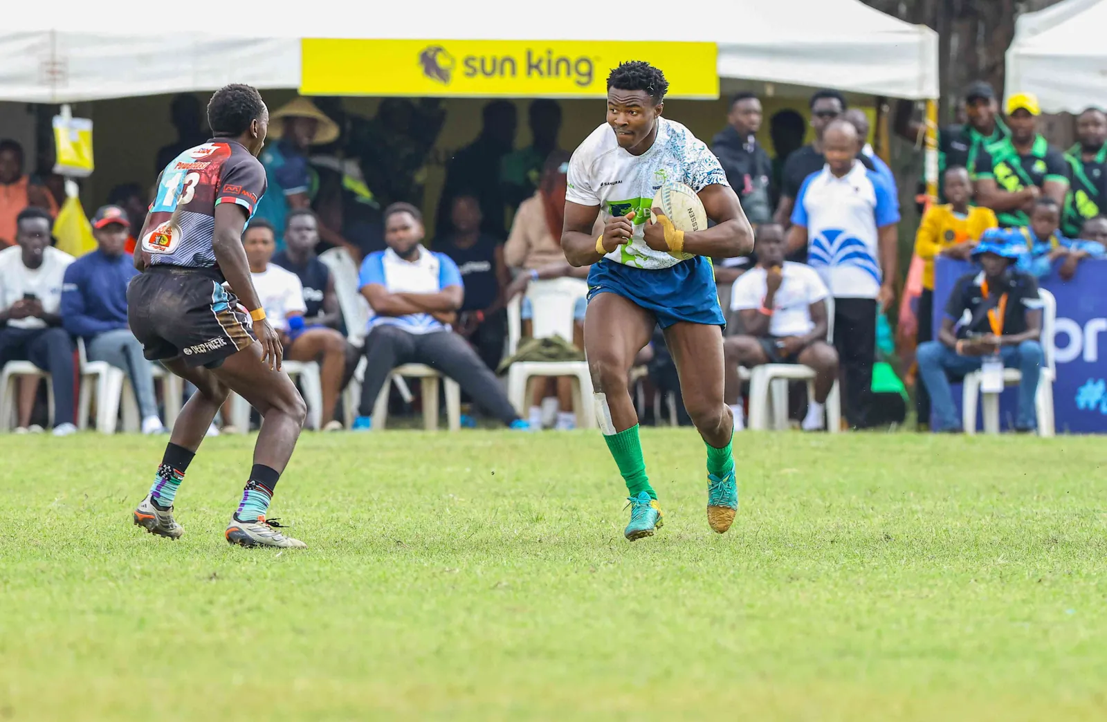 KCB forward Elvis Olukusi (right) in action against Kenya Harlequin. [KCB RFC]​