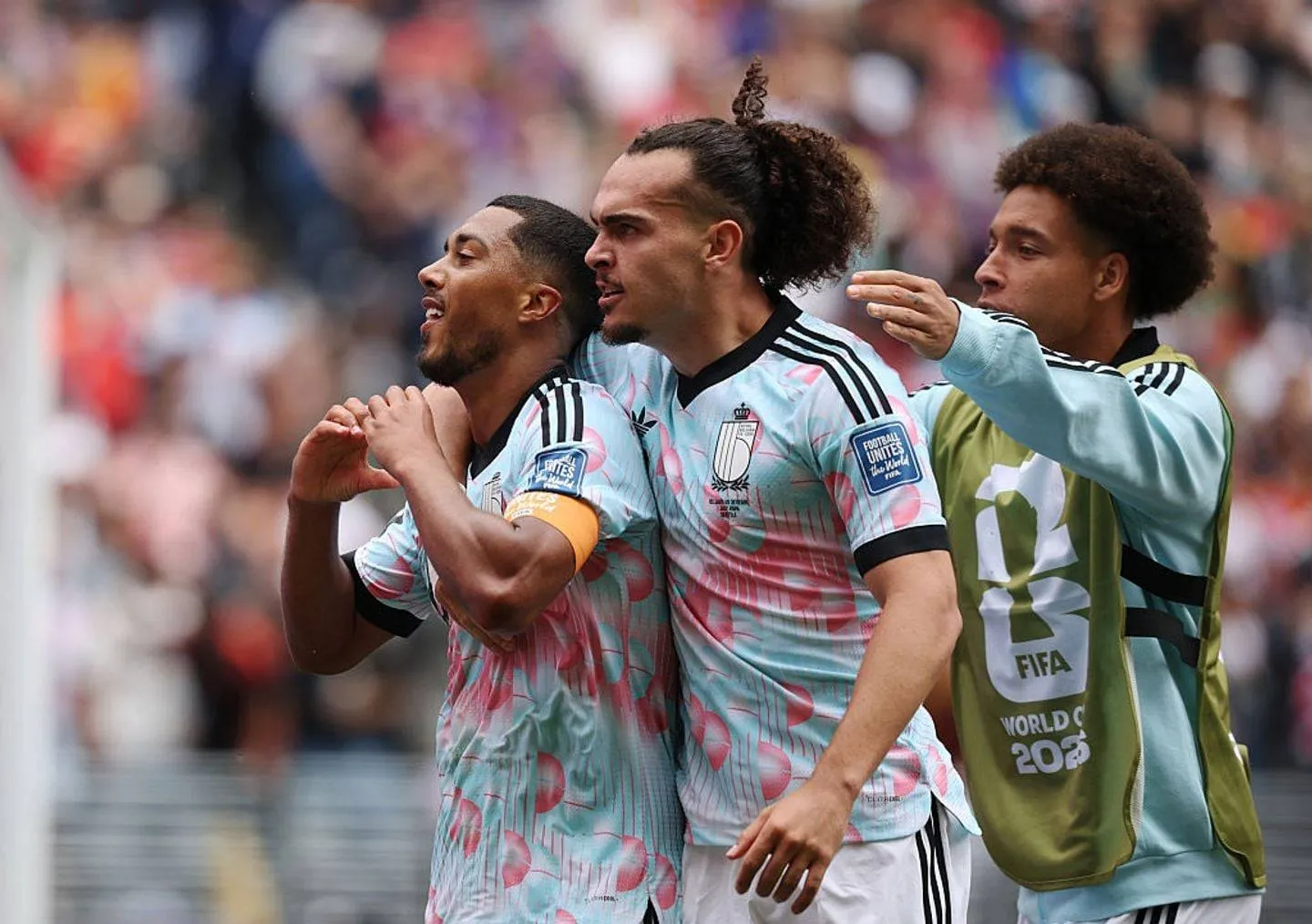SEATTLE, WASHINGTON - JULY 01: Youri Tielemans #8 of Belgium celebrates with teammates Arthur Theate #3 and Axel Witsel #6 scoring his team's second goal during the FIFA World Cup 2026 Round Of 32 match between Belgium and Senegal at Seattle Stadium on July 01, 2026 in Seattle, Washington. (Photo by Jared C. Tilton - FIFA/FIFA via Getty Images)