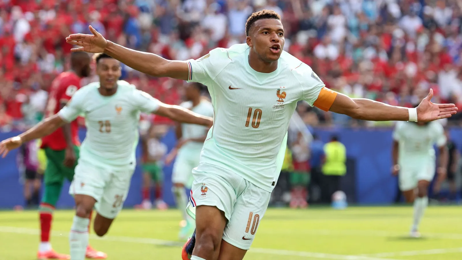Kylian Mbappe celebrates scoring his team's first goal during the 2026 World Cup football tournament quarter-final match against Morocco