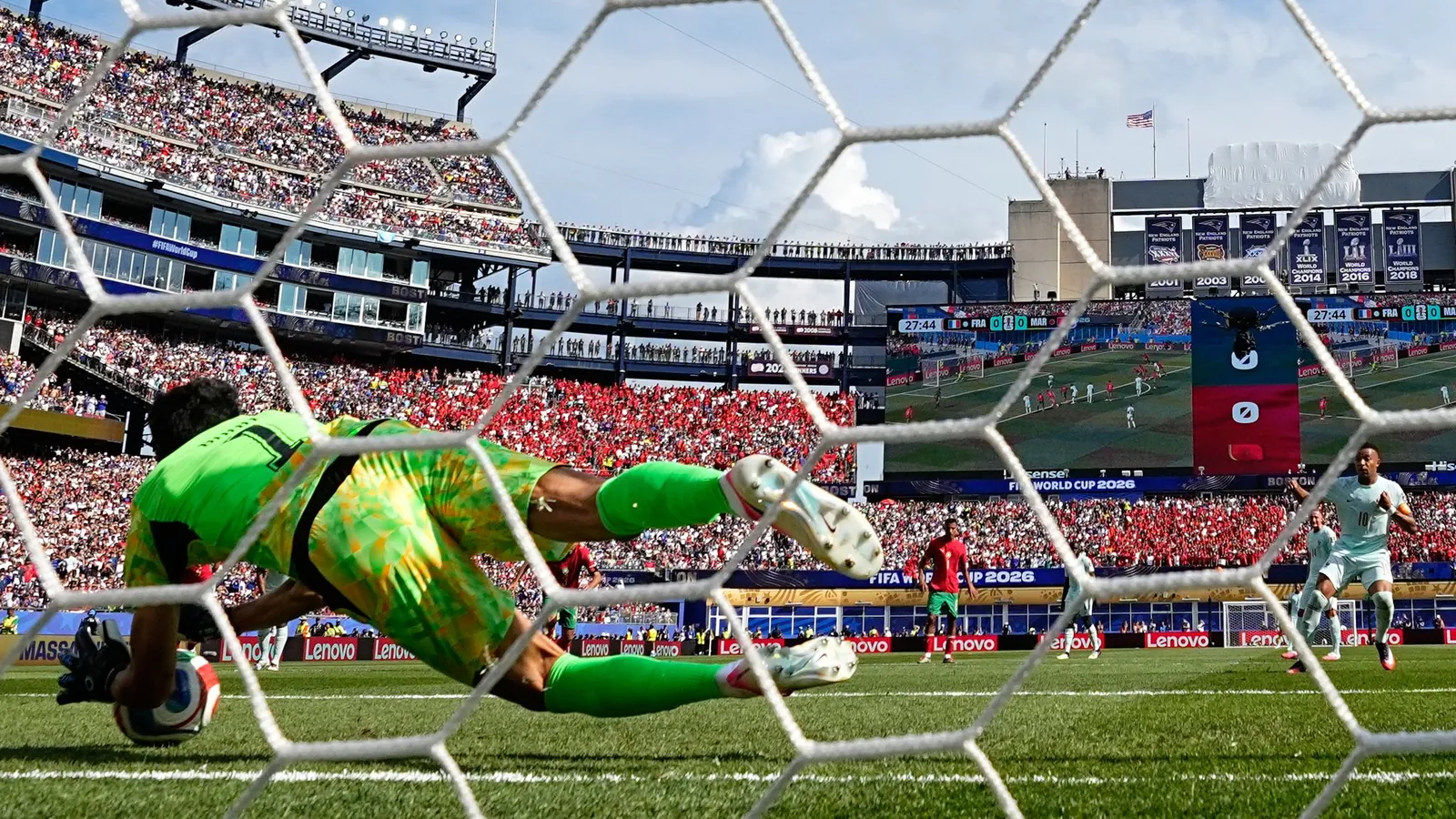 Morocco goalkeeper Yassine Bounou saves a penalty from France's Kylian Mbappe during the World Cup quarter-final