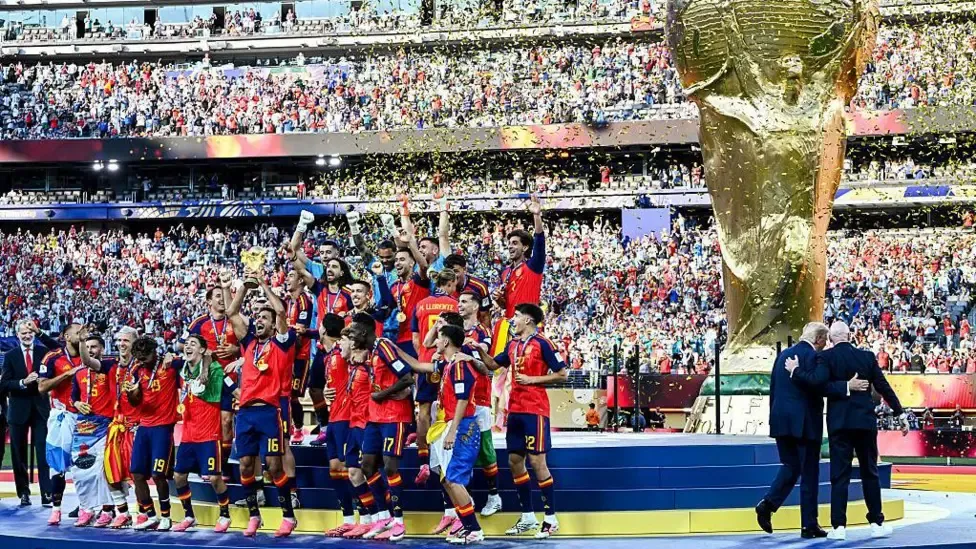 Spain's players celebrate winning the World Cup