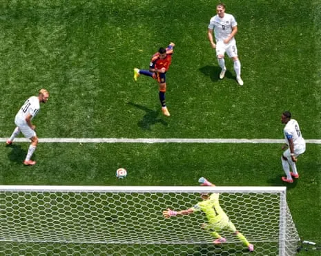 Spain's Pedro Porro (left) scores their second goal against Austria.