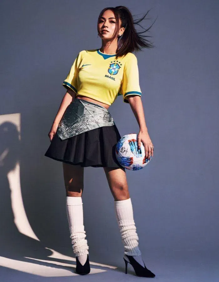 Nike Brazil National Team 2026 Stadium Home Dri-FIT football jersey,Chamber. Mini pleated skirt, & Other Stories. Silk printed scarf (tied around the waist), Longchamp. Stockings and heels, stylistâs own.Photography: Zantz Han