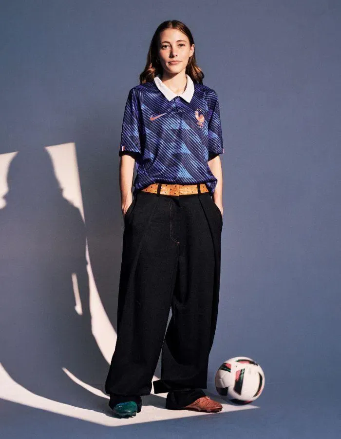 Nike France National Team 2026 Match Home Dri-FIT football jersey,Chamber. Trousers with leather waistband, MCM. Football boots, Priscillieâs own.Photography: Zantz Han