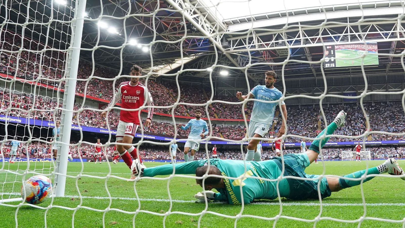 Arsenal's Kai Havertz (left) scores their second goal against Manchester City in the Community Shield