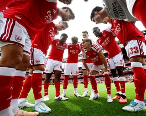 Arsenal captain Martin Ødegaard speaks to his team before the pre-season friendly with Dortmund